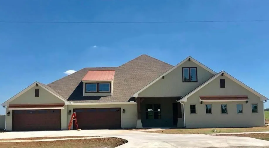 Custom home exterior by Jack Steed Homes — view 1