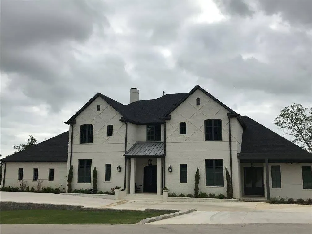 Custom home exterior by Jack Steed Homes — view 6