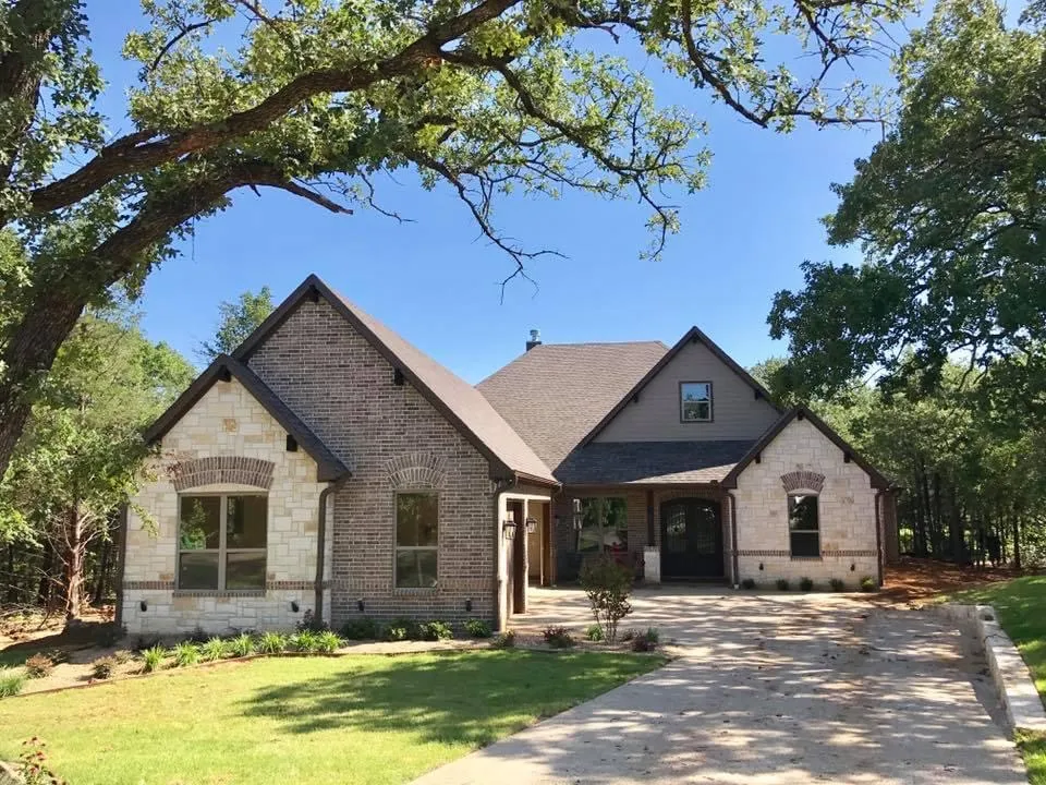 Custom home exterior by Jack Steed Homes — view 8