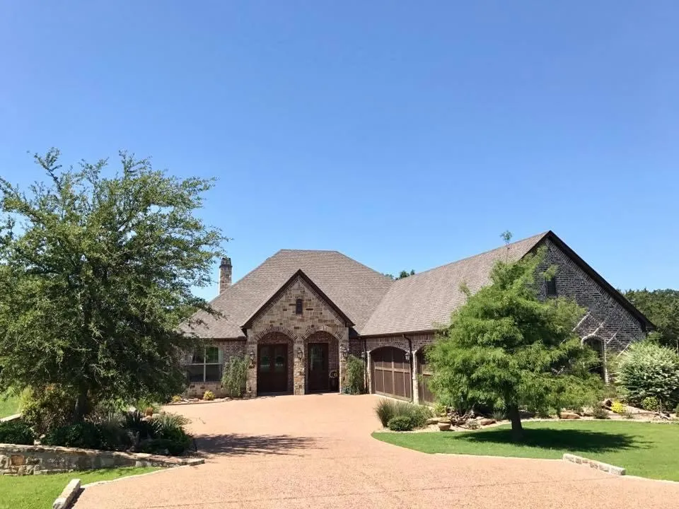 Custom home exterior by Jack Steed Homes — view 9